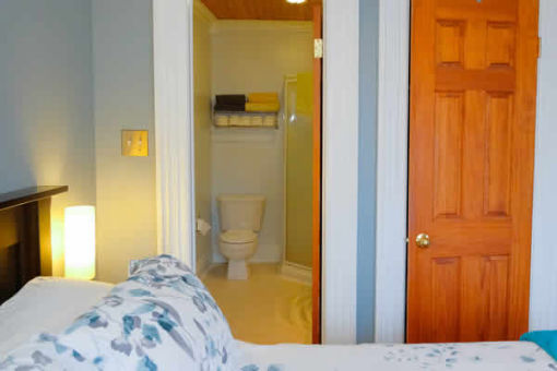 image: view of bathroom and closet doors