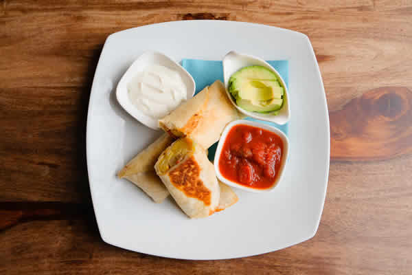 image: overhead view of plate with breakfast burrito